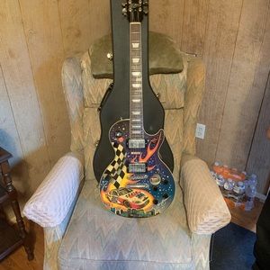 Gibson Guitar painted by Sam Bass.
